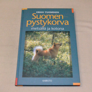 Erkki Tuominen Suomenpystykorva metsällä ja kotona